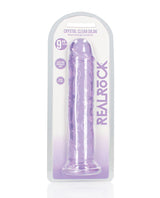 RealRock Crystal Clear 9 inch Dildo Suction Cup Purple in packaging, showcasing its sleek design and vibrant purple color.