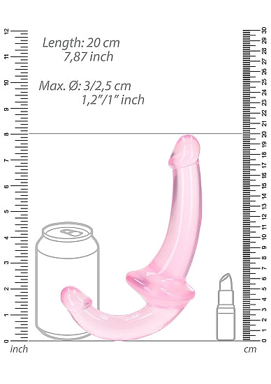 Realrock Crystal Clear Strapless Strap-On 6 Inch Pink dimensions next to a can and spray for size comparison.