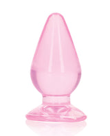 Shots RealRock Crystal Clear 3.5 inch Anal Plug Pink showcasing its tapered design and smooth finish.
