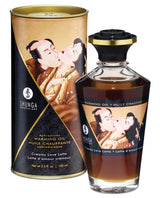 Shunga Warming Oil Creamy Love Latte 3.5 Oz in a decorative bottle and packaging, perfect for enhancing intimate moments.