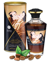 Shunga Warming Oil Creamy Love Latte 3.5 Oz in elegant packaging with coffee beans, enhancing intimate moments.