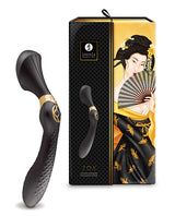 Shunga Zoa Intimate Massager Black displayed next to elegant packaging featuring a traditional design.