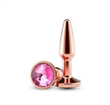 Rear Assets Tapered Small Anal Plug Rose Gold with pink gemstone detail, designed for comfort and style in intimate play.