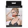 Sportsheets Saffron Soft Bit Gag packaging with model demonstrating use