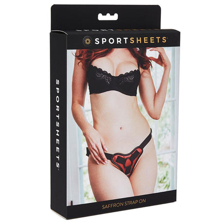 Sportsheets Saffron Strap On Harness Red Black packaging featuring a model showcasing its stylish design.