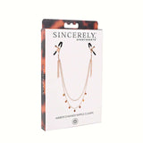 Sincerely Amber Chain Nipple Jewelry packaging featuring elegant amber chained nipple clamps for sensual allure.