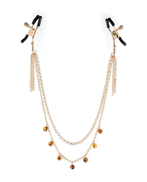 Sincerely Amber Chain Nipple Jewelry featuring a gold chain design with decorative beads for sensual allure.