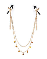 Sincerely Amber Chain Nipple Jewelry featuring a gold chain design with decorative beads for sensual allure.