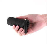 Renegade Supreme Silicone Penis Sleeve Black held in hand, showcasing its stretchy silicone design and added length.