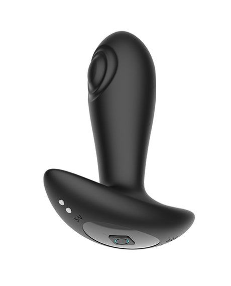 Secwell Reggie Tapping Anal Plug Black remote-controlled with dual vibrating bullets and rhythmic tapping motion.