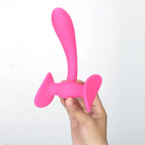 Maia Paislee Dual Motor Remote Control Thigh Hold Thumping Vibrator held in hand, showcasing its unique shape and design.