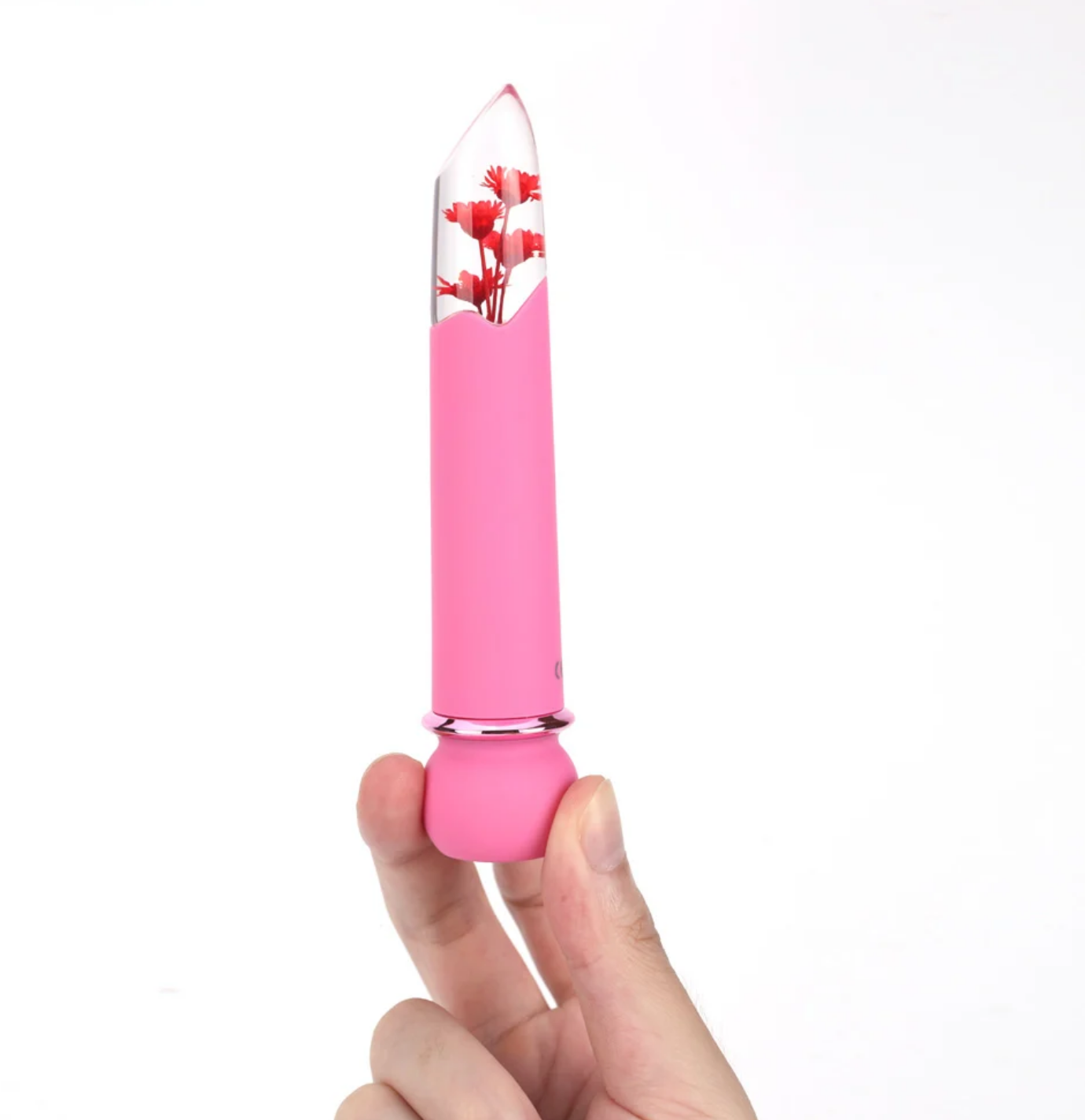 Maia Flora Fiercely Powerful Bullet Vibrator Pink in hand, showcasing clear tip with faux flowers and soft silicone shaft.