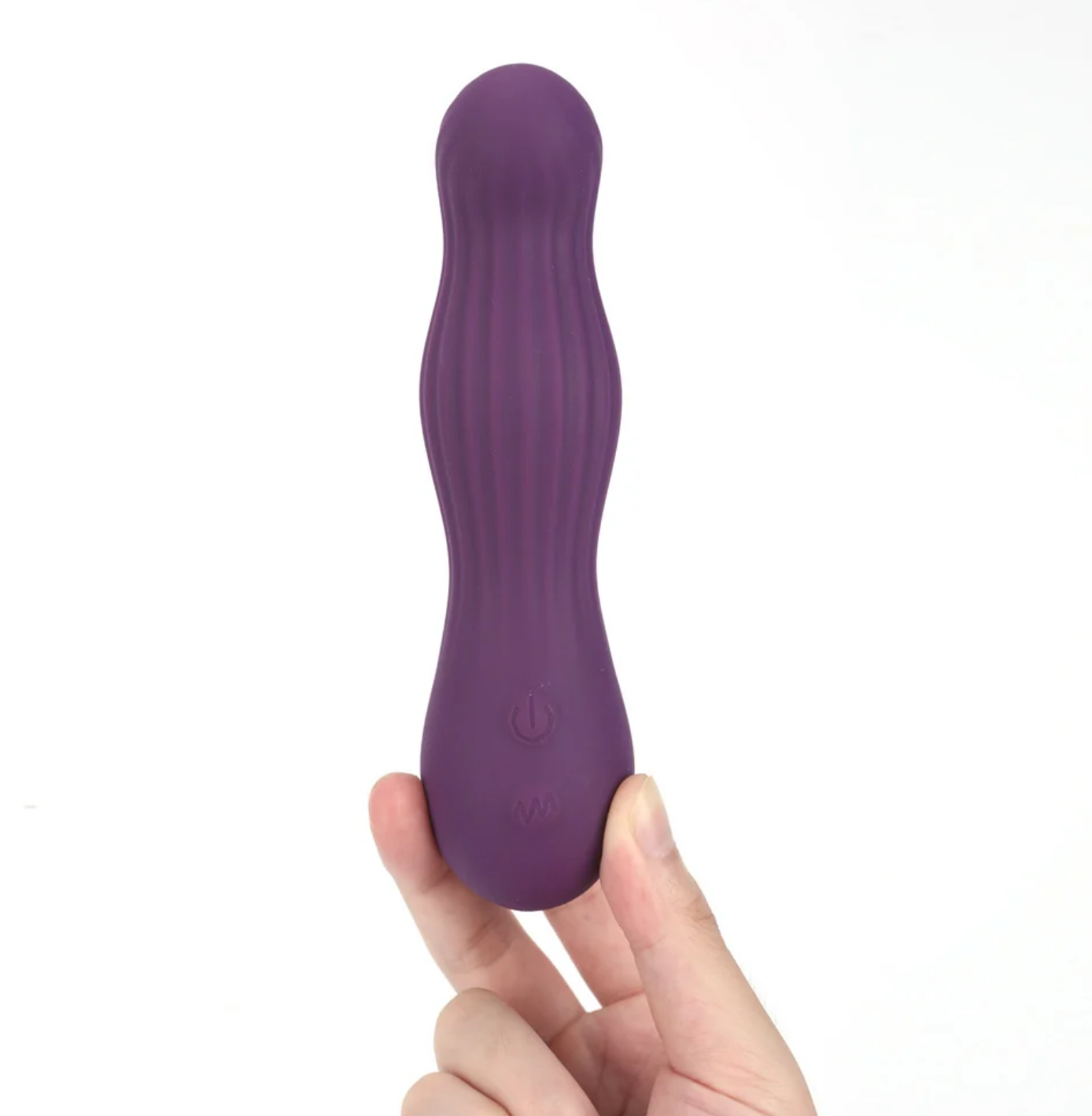 Maia Mesa Liquid Silicone G-Spot Vibrator held in hand, featuring a flexible, ergonomic design and texture.