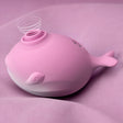 Tracys Dog Whalo Air Suction Massager in sleek pink design on soft fabric.