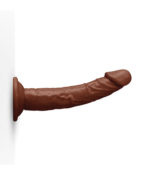 Together 6.75 Inch Realistic Suction Cup Dildo Dark with lifelike design mounted on a flat surface.