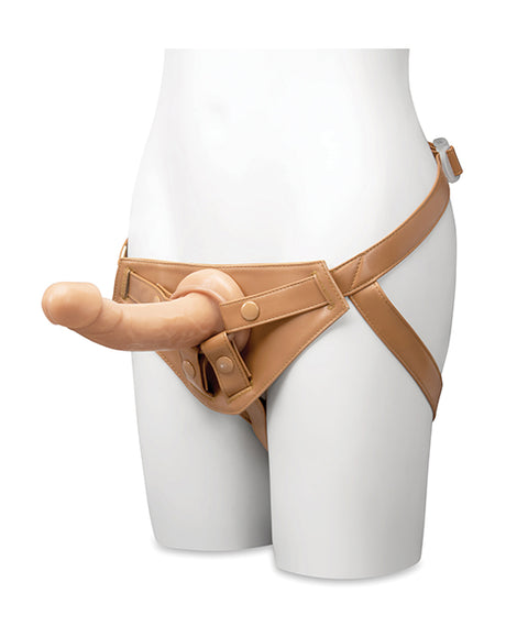 Together 8 Inch Realistic Dildo Suction Base Caramel attached to a harness on a mannequin for intimate pleasure.