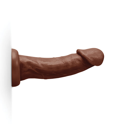 Together 9 Inch Realistic Suction Base Dildo Chocolate sticking to a flat surface for hands-free enjoyment.