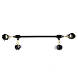 Luxury BDSM black restraint bar with gold accents and adjustable cuffs for versatile play and high-end experiences.
