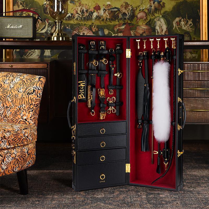 UPKO Luxury BDSM 15-piece Sade Trunk Kit displayed open, showcasing handmade Italian leather tools in a chic black trunk.