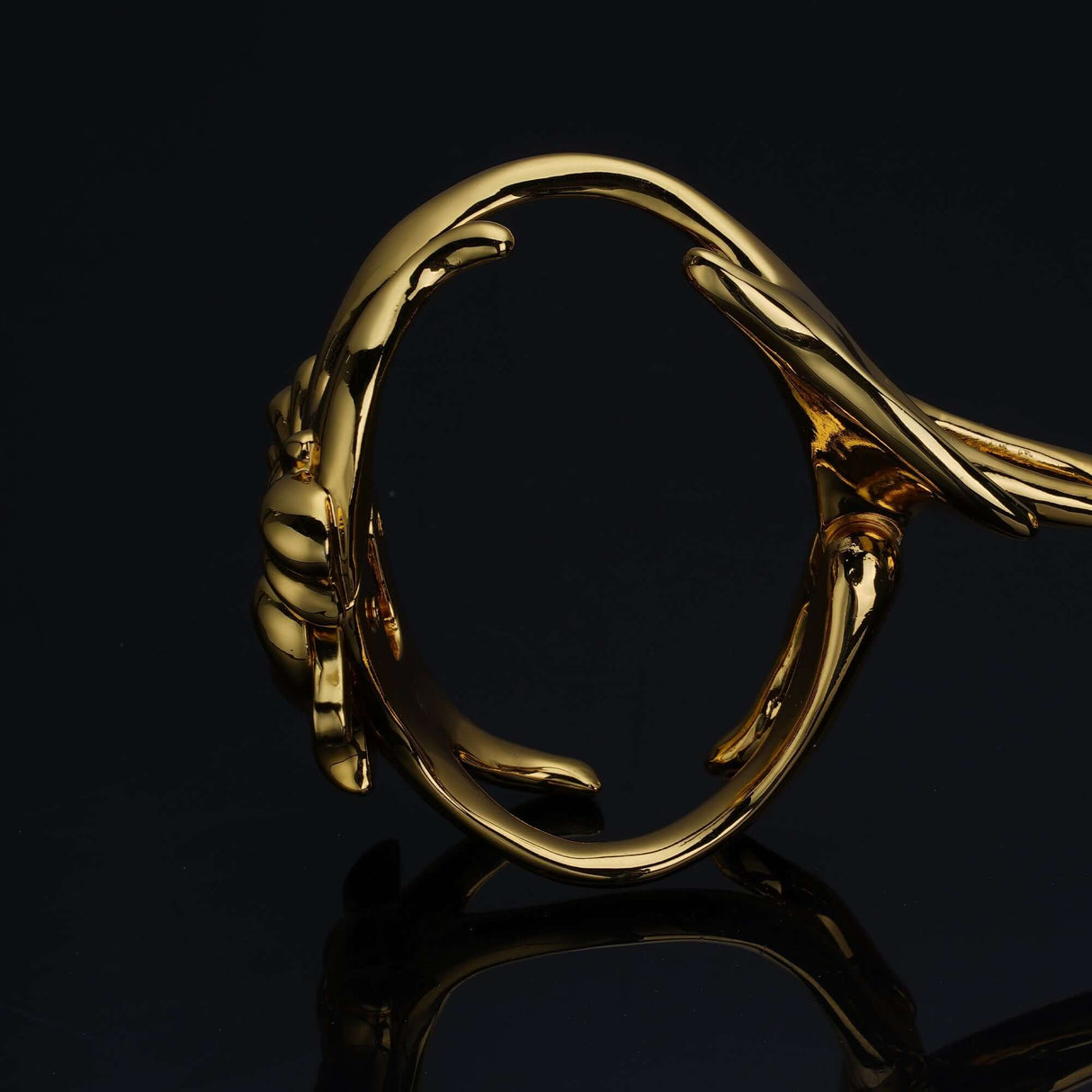 UPKO Ripple Metal Handcuffs showcasing polished gold metal design and structured, secure form.