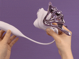 UEROS Suction & Insertable Vibrator Set Dual Function Purple held in hands demonstrating its design and features.