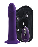 Vedo Diki Vibrating Dildo with Harness Deep Purple, featuring a silicone shaft and wireless remote for versatile play.