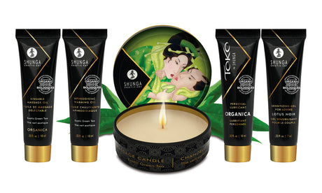 Shunga Geisha Secrets Gift Set Organica Exotic Green Tea with five travel-sized products and a scented candle.