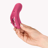 Fun Factory Laya III Lay-on Vibrator Magenta held in hand, showcasing its ergonomic design and controls.