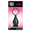 Wood Rocket Grey Butt Plug Keychain on packaging with a pink background and glossy finish, perfect for playful gifting.