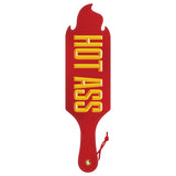 Wood Rocket Hot Ass Spanking Paddle Red featuring bold yellow lettering on a fiery red background.