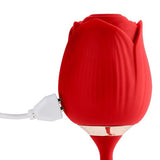 Image of Cloud 9 Rose Plus Thrusting & Suction Pleasure rechargeable stimulator with charging cable.