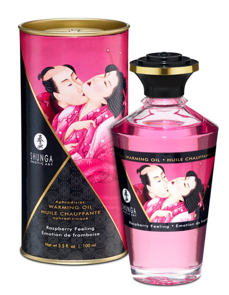 Shunga Aphrodisiac Warming Oil Raspberry Feeling 3.5 Oz bottle and packaging showcasing the erotic art design.