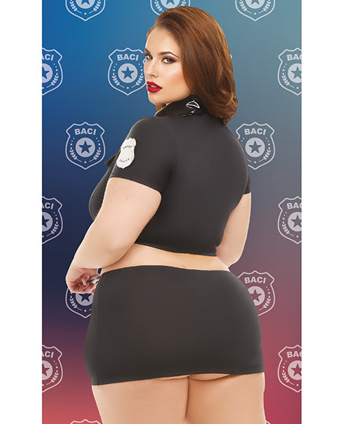 Dreams by Baci Badge of Desire Cop Costume Set Black Queen model showcasing the outfit from behind in a vibrant setting.