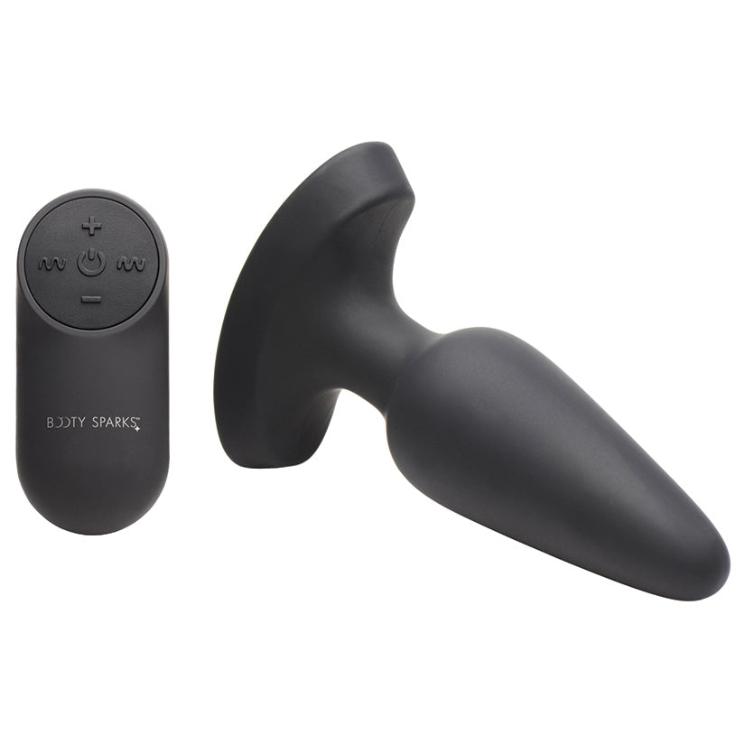 Booty Sparks 28x Laser Heart Silicone Anal Plug With Remote Medium displayed alongside its remote control.