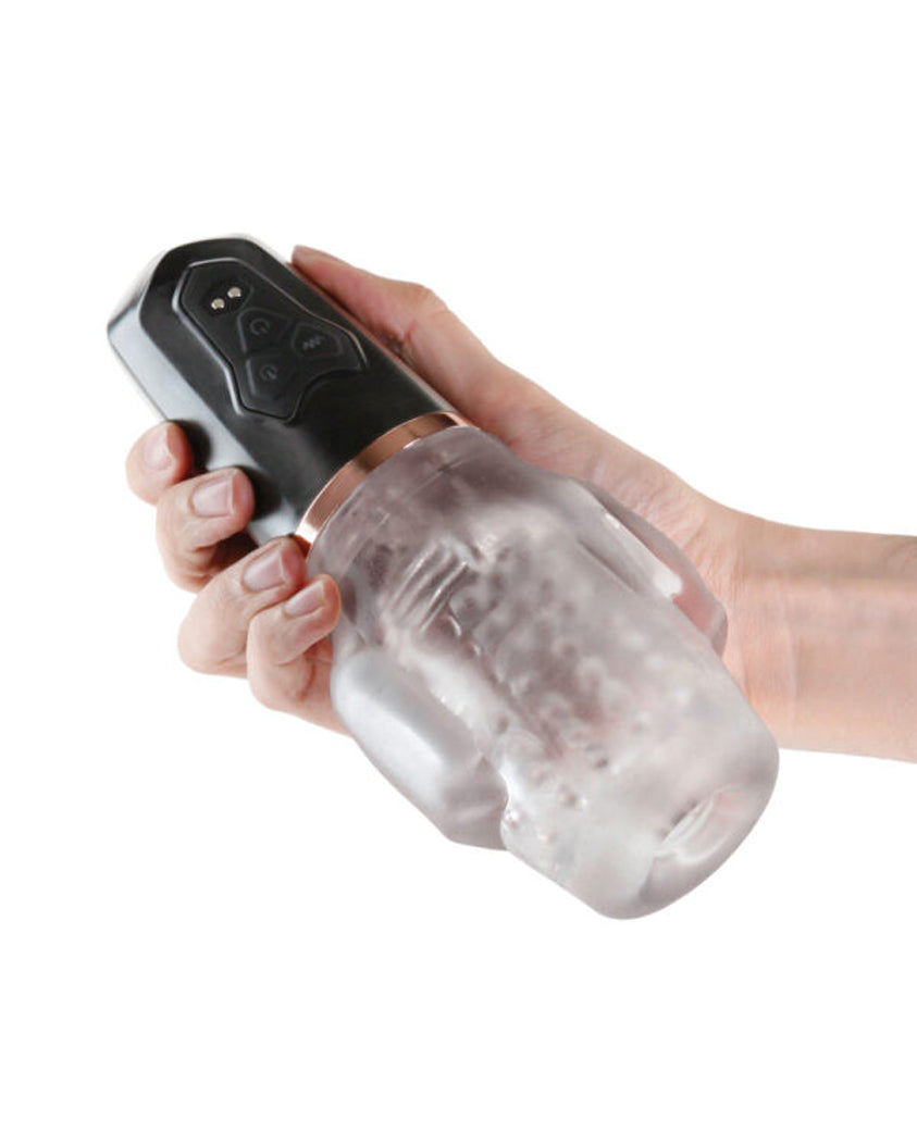 Renegade Avenger Rechargeable Mouth Stroker Black held in hand, showcasing its design and controls for hands-free pleasure.