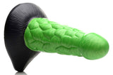 Radioactive Reptile Thick Scaly Silicone Dildo Green with metallic green shaft and black base, featuring a textured, scaly surface.