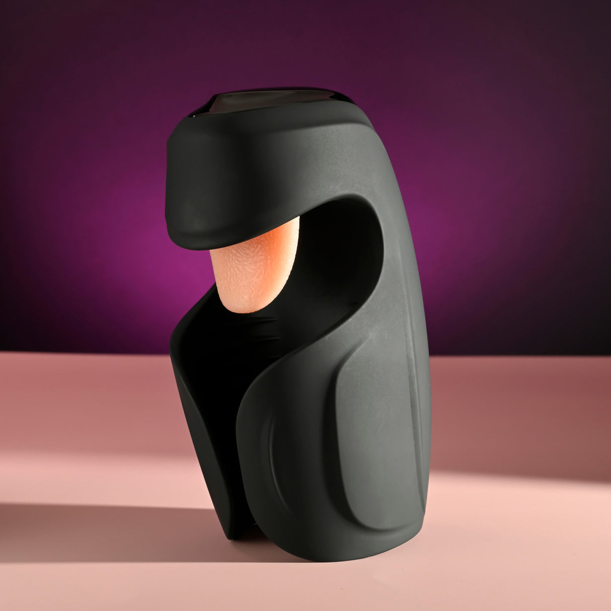 Lick the Tip Vibrating Tongue Stroker Black design showcasing its unique shape and integrated tongue for pleasure.