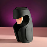 Lick the Tip Vibrating Tongue Stroker Black design showcasing its unique shape and integrated tongue for pleasure.