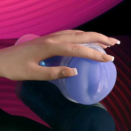 Zero Tolerance Pop On The Glow Pussy Stroker Purple held in hand showing its realistic design and glow-in-the-dark feature.