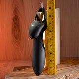 Zero Tolerance Nautilus Vibrating Penis Sleeve Black displayed alongside a measuring tape for size reference.