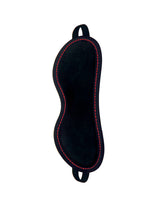Orange Is the New Black Leatherette Blindfold with vibrant orange stitching for sensory play.