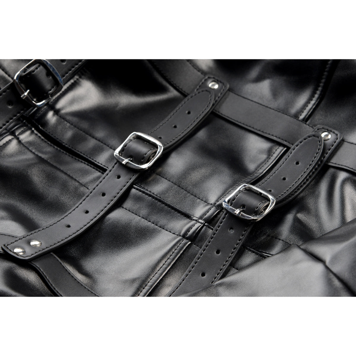 Close-up of STRICT Straight Jacket Medium Faux Leather Black with buckles and straps for restraint.