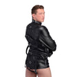STRICT Straight Jacket Medium Faux Leather Black model showcasing the bondage design and secure buckles.