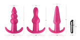 Thrill Trio Anal Plug Set Pink featuring three different plugs and a bullet vibe, ideal for exploration and pleasure.