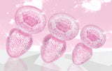 Booty Sparks Glitter Gem Anal Plug Set Pink featuring smooth, glittery pink plugs in graduated sizes.