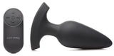 28X Laser Heart Silicone Anal Plug with Remote Large next to its remote control.