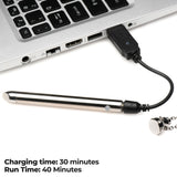 Charmed 7X Vibrating Necklace Silver charging via USB with laptop, showing charging time of 30 minutes, run time of 40 minutes.