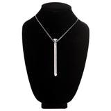 Charmed 7X Vibrating Necklace Silver displayed on a black necklace stand, showcasing its sleek design and features.