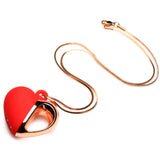 10X Vibrating Silicone Heart Necklace featuring a red silicone heart pendant with a rose gold chain.