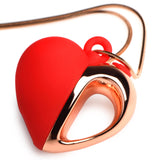 10X Vibrating Silicone Heart Necklace featuring a red silicone heart with rose gold accents on a chain.